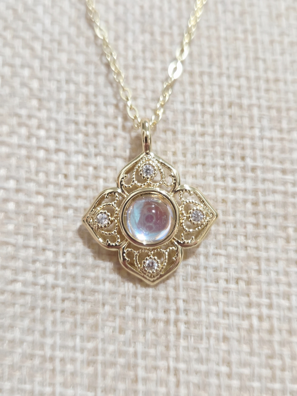 Gold Floral Halo Pendant Necklace with Iridescent Center